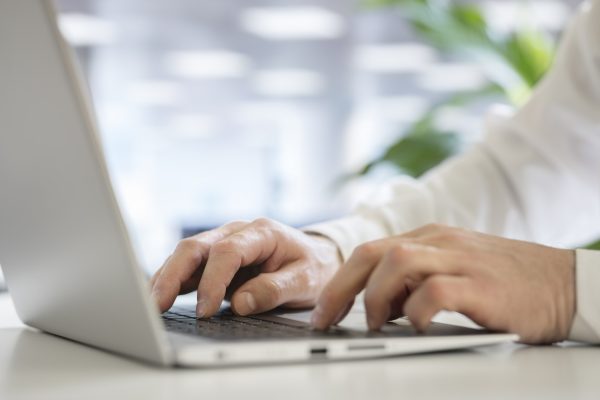 hands-typing-on-laptop-computer.jpg